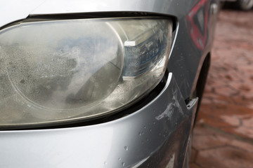 Closeup of crashed car hit on the front bumper off