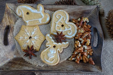 Decorative Christmas cookies, almonds, nuts, cinnamon and anise stars.Christmas sweets and nuts. Christmas time
