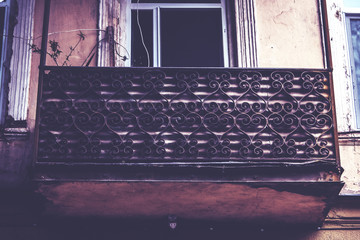 Old Tbilisi architecture, window and exterior decor in summer day.