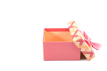 Pink gift box with ribbon bow isolated