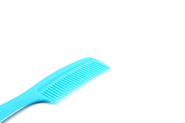 blue plastic comb isolated