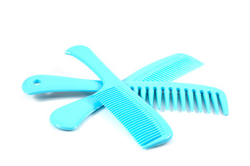 Set of blue plastic comb isolated