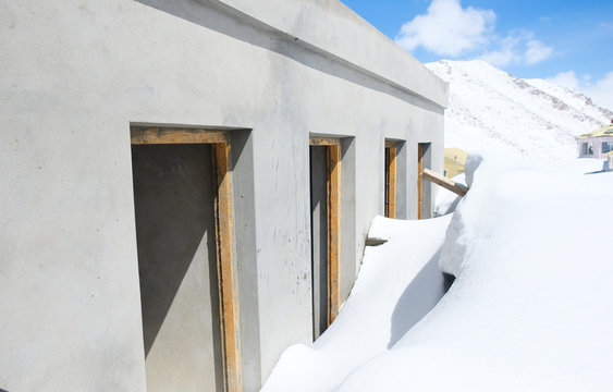 Toilet rooms covered in Snow at Rest Area in Chang La pass,India.the second highest motorable road in the world ( 5,360 m or 17,590 ft)