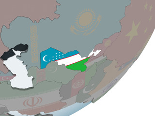 Uzbekistan with flag on globe
