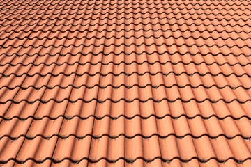 Red roof tiles. Abstract background texture Czech architectural details with some dirty on tiles.