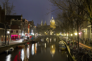 Fototapeta premium Amsterdam, Netherlands, Gothic Oude Kerk Church. The ancient Church the Oude Kerk is a Gothic Church, the oldest surviving buildings of the Dutch capital