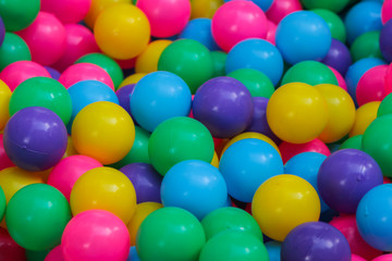 Fototapeta na wymiar Many colorful plastic balls
