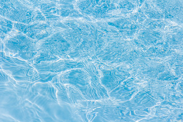 Detail of Wave water in the blue swimming pool