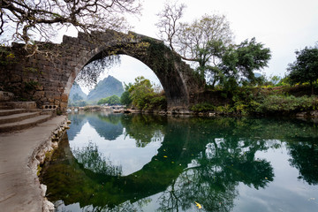 Old bridge on Dragon river in Yangshuo China