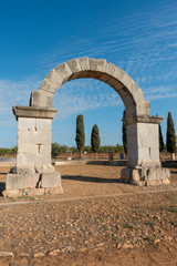 Fototapeta na wymiar Roman arch on the camino de santiago and via augusta de cabanes