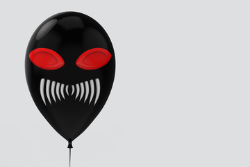 3d rendering. horror halloween devil face black balloon with clipping path on gray copy space background.