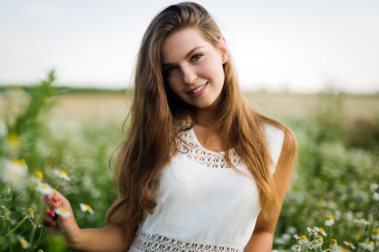 Fototapeta Young beautiful woman spending time in nature