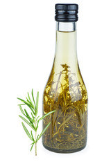 Fresh green sprigs of rosemary and apple vinegar isolated on a white background