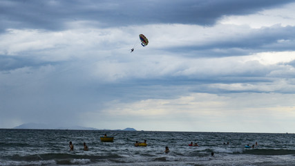 A parachute flight over the sea in the city of Danang, Vietnam.