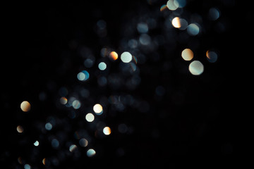 Black bokeh texture on black