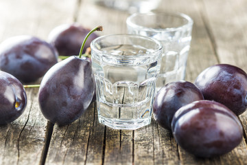 Plum brandy and plums.