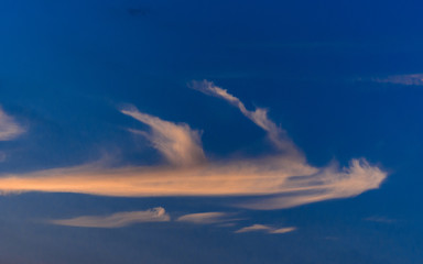 Dramatic sunset sky with colorful clouds after thunderstorm