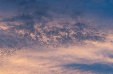 Dramatic sunset sky with colorful clouds after thunderstorm