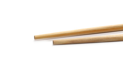 Asian wooden chopsticks isolated on white background
