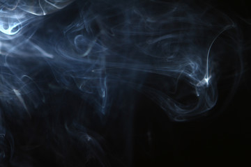 amazing swirl contrast bright smoke on heavy black background.