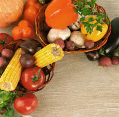 frame of fresh vegetables on a wooden background