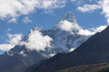 Ama Dablam surrounded by clouds in a morning at Tengboche village, Everest region, Nepal
