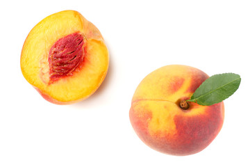 peach fruit with green leaf and slices isolated on white background. top view