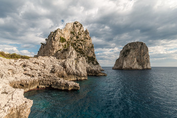Fototapeta na wymiar View of Capri island (Italy) with Faraglioni