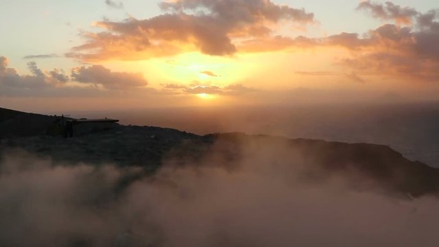 sunset on the crater of Vulcano with sulfur fumaroles, Aeolian Islands, Sicily