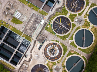 Fly drone over Sewage treatment plant