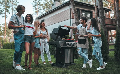 Group of friends on barbeque party