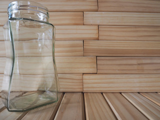 Fototapeta na wymiar bottle clear on the wooden background