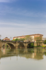Fototapeta na wymiar Historic Peidra bridge crossing the Ebro river in Logrono, Spain