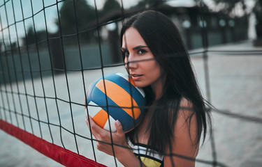 Young woman playing volleyball
