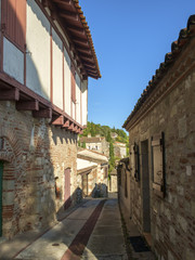 There is much traditional architecture to be seen lining the narrow streets of travel destination Penne d'Agenais, Lot et Garonne, France. 