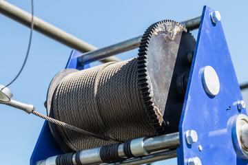 metal cable on the winch reel for transportation and self-pulling construction equipment