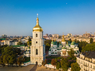 Fototapeta na wymiar Saint Sophia's Cathedral, square. Kiev (Kiyv) Ukraine with Places of Interest. Aerial drone photo. Sunrise light. Golden domes