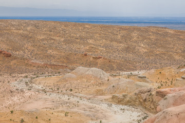 the landscape of a stone desert with hills, the mountains of Genghis Khan, the Altyn-Emel National Park in Kazakhstan