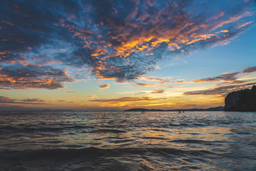 Fototapeta na wymiar Sunset at beach sea sky clouds twilight time