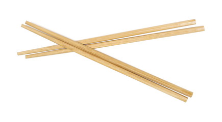 Asian wooden chopsticks isolated on white background, top view