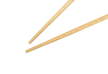 Asian wooden chopsticks isolated on white background, top view