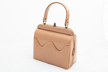 Elegant female bag on white background isolated..