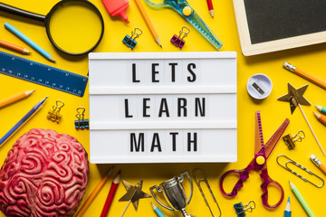 Lets learn math lightbox message on a bright yellow background