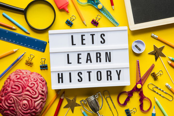 Lets learn history lightbox message on a bright yellow background