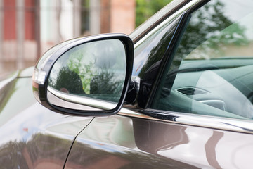 Side mirror of modern car.