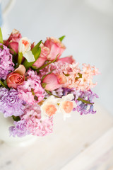 Bouquet of flowers: lilac, daffodil, tulip, peony, rose