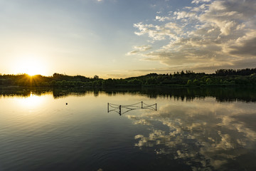 Fototapeta premium Tramonto sul lago olimpico
