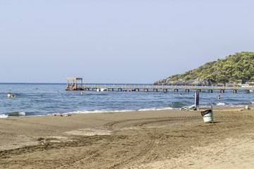 Fototapeta na wymiar Perspective shoot of empty coastline of Mediterranean sea in Turkey