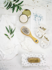 Small Things for the Newborn. Towel, Diaper, Comb, Body, Socks, Soap. Beautiful Children's Necessary Things.
