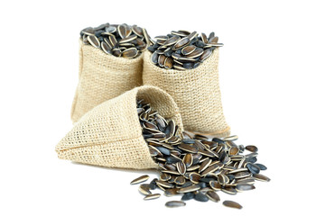 sunflower seeds in bag isolated on white background